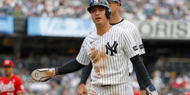 New York Yankees shortstop Anthony Volpe reacts after being picked off first base.