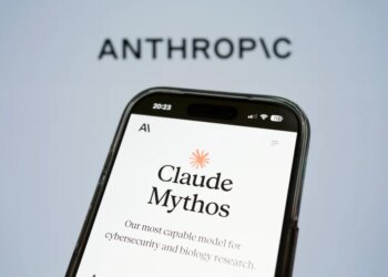 A smartphone displaying "Claude Mythos" by Anthropic on its screen.
