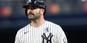New York Yankees catcher Austin Wells (28) reacts during the fourth inning against the Cleveland Guardians at Yankee Stadium.