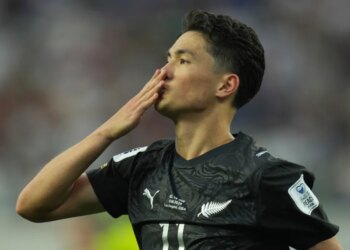New Zealand's Elijah Just blows a kiss to the crowd after scoring a goal during a World Cup Group G soccer match.