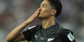 New Zealand's Elijah Just blows a kiss to the crowd after scoring a goal during a World Cup Group G soccer match.