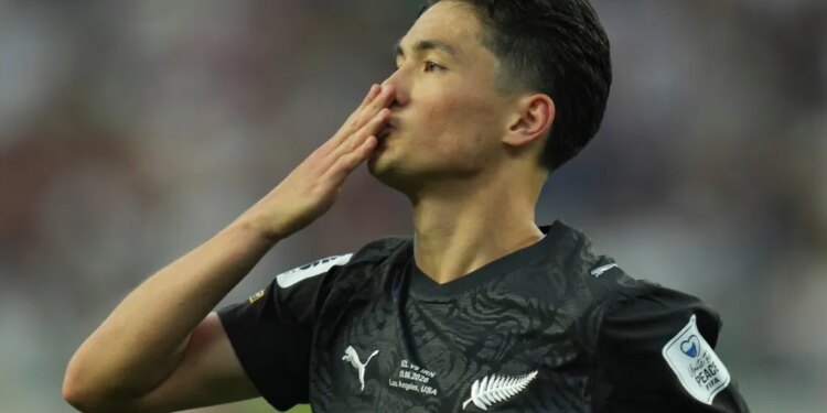 New Zealand's Elijah Just blows a kiss to the crowd after scoring a goal during a World Cup Group G soccer match.