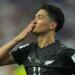 New Zealand's Elijah Just blows a kiss to the crowd after scoring a goal during a World Cup Group G soccer match.