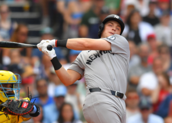 New York Yankees' Ben Rice, right, strikes out swinging in front of Boston Red Sox catcher Carlos Narváez, left, in the ninth inning of a baseball game, Saturday, June 27, 2026, in Boston.