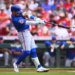 New York Mets' Bo Bichette (19) hits a single during the first inning.