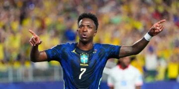 Vinicius Junior celebrates a goal for Brazil.