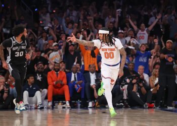 New York Knicks guard Jordan Clarkson #00 reacts after hitting a three-point shot in Game 3 of the 2026 NBA Finals.