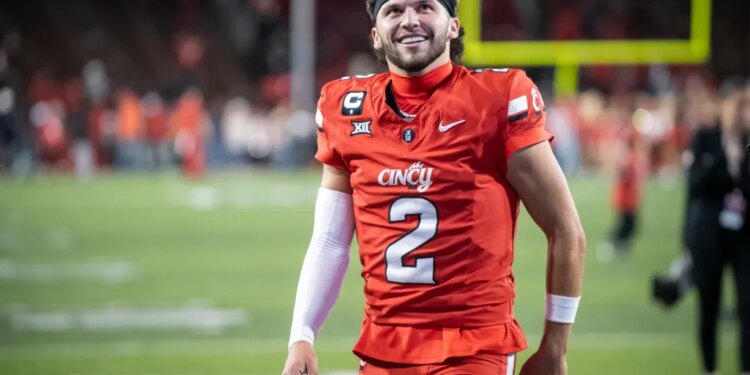 Cincinnati quarterback Brendan Sorsby (2) walks off the field.