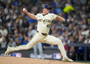 Milwaukee Brewers pitcher Quinn Priester throws against the Los Angeles Dodgers.