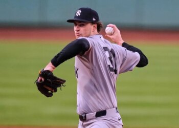 New York Yankees' Cam Schlittler delivers a pitch during a baseball game.