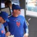 New York Mets manager Carlos Mendoza #64 in the dugout.