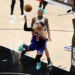 New York Knicks guard Josh Hart (3) and San Antonio Spurs guard De'aaron Fox (4) look for the ball during game five of the 2026 NBA Finals at Frost Bank Center.