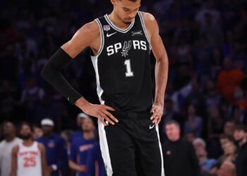 San Antonio Spurs forward Victor Wembanyama #1 reacts on the court during a foul shot in the fourth quarter.