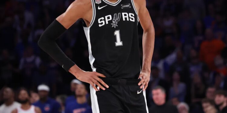 San Antonio Spurs forward Victor Wembanyama #1 reacts on the court during a foul shot in the fourth quarter.