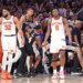 New York Knicks center Karl-Anthony Towns #32 and forward Og Anunoby #8 react on the court as San Antonio Spurs players walk by during the NBA Finals Game 3.