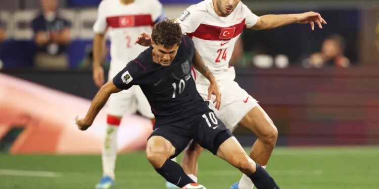 Christian Pulisic looks to make a move on Oguz Aydin during the USMNT's 3-2 loss to Turkey on June 25, 2026 in Inglewood, Calif.