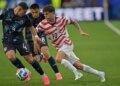 United States' Christian Pulisic (10) runs with the ball during the World Cup Group D soccer match against Paraguay.