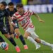 United States' Christian Pulisic (10) runs with the ball during the World Cup Group D soccer match against Paraguay.