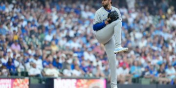 Chicago Cubs' David Peterson in his pitching motion on the mound.