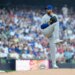 Chicago Cubs' David Peterson in his pitching motion on the mound.