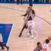 Basketball players from the Spurs and Knicks during a game.