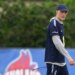 England head coach Thomas Tuchel walks on a field during practice.