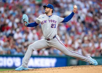New York Mets relief pitcher David Peterson delivers a pitch.