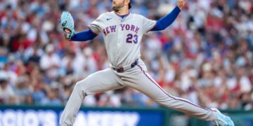 New York Mets relief pitcher David Peterson delivers a pitch.