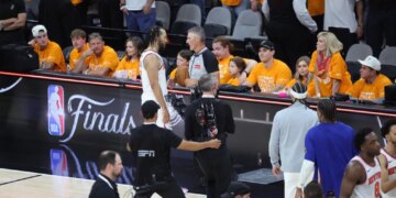 A fan accused of verbally harassing Knicks guard Jalen Brunson on Wednesday has been banned from sitting courtside for the rest of the NBA Finals.