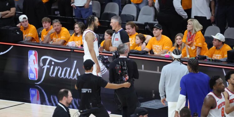A fan accused of verbally harassing Knicks guard Jalen Brunson on Wednesday has been banned from sitting courtside for the rest of the NBA Finals.