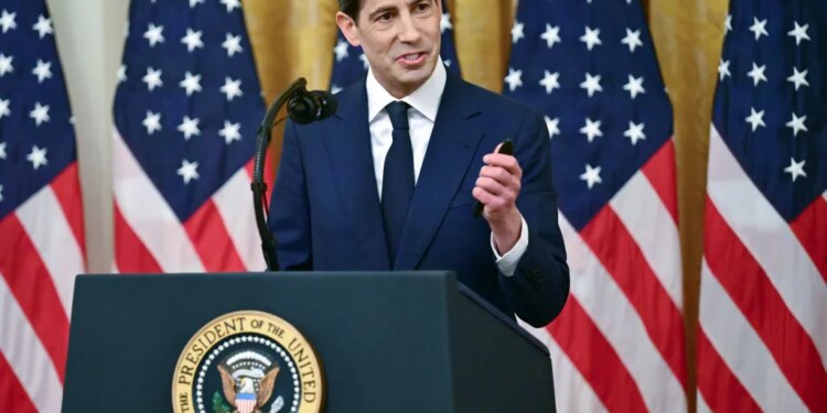 Kevin Warsh, sworn in as Federal Reserve Chair, speaks at a podium with the Seal of the President of the United States.