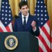 Kevin Warsh, sworn in as Federal Reserve Chair, speaks at a podium with the Seal of the President of the United States.