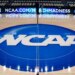 NCAA logo at center court in an arena.