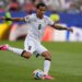 Iraq's Ibrahim Bayesh (8) passes the ball during a soccer match.