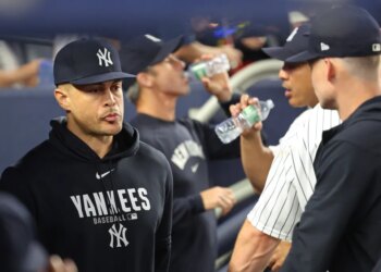 Giancarlo Stanton in the New York Yankees dugout.