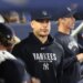 Giancarlo Stanton of the New York Yankees in the dugout.