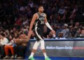 Giannis Antetokounmpo of the Milwaukee Bucks walks to the bench during the fourth quarter.