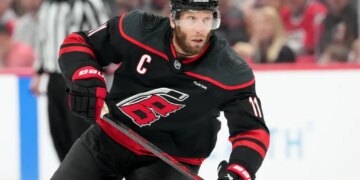 Carolina Hurricanes center Jordan Staal (11) skates with his stick against the Montreal Canadiens during a game.