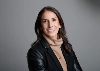 Gotham FC General Manager Yael Averbuch West smiles at the camera.