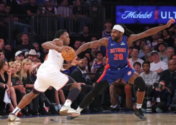 New York Knicks forward OG Anunoby drives to the basket as Detroit Pistons center Isaiah Stewart chases during the second quarter.
