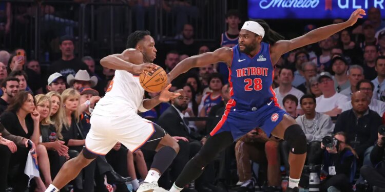 New York Knicks forward OG Anunoby drives to the basket as Detroit Pistons center Isaiah Stewart chases during the second quarter.