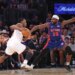 New York Knicks forward OG Anunoby drives to the basket as Detroit Pistons center Isaiah Stewart chases during the second quarter.