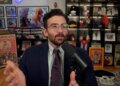 Hasan Piker speaking into a microphone.