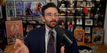 Hasan Piker speaking into a microphone.