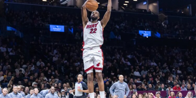 Andrew Wiggins #22 of the Miami Heat slams the ball during the second half at Barclays Center.