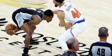 De'Aaron Fox struggles to keep the ball away from Landry Shamet during the Knicks' 105-95 Game 1 win over the Spurs in the NBA Finals on June 3, 2026 in San Antonio.