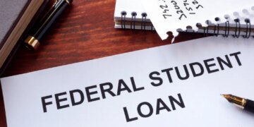 Federal student loan form on a table.