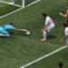 Iran goalkeeper Alireza Beiranvand saves the soccer ball during a World Cup match.