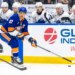 New York Islanders left wing Anders Lee (27) skates with the puck during a game against the Toronto Maple Leafs.