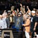 New York Knicks guard Jalen Brunson holds up the MVP trophy after winning the NBA Championship.